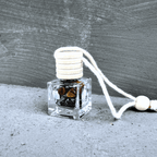 Talisman Hecatoo Ochrana z obsidiánu, tygřího oka, křišťálu, onyxu a labradoritu ve skleněné lahvičce s dřevěným víčkem pro sílu a ochranu energie.